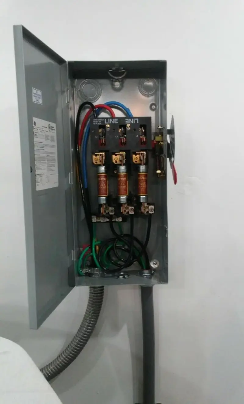Three-phase disconnect switch installed for Smoke Detector Installation in Winder